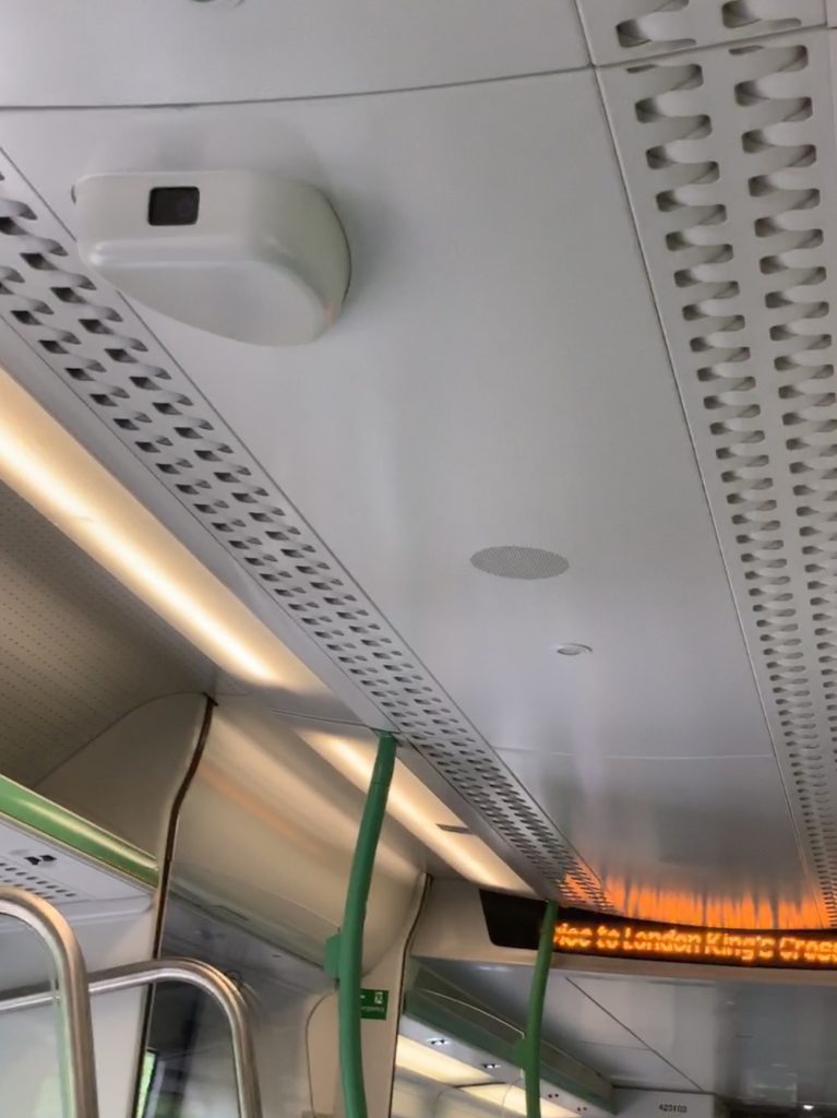 A surveillance camera on the Cambridge-London train